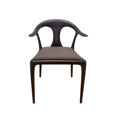 comprar Silla de comedor escultural de fresno con líneas dinámicas y asiento de cuero capitoné para restaurantes y hogares online manufacture